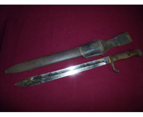 WWI period German bayonet with 14 1/4 inch swollen single fullered blade stamped Fichtel &amp; Sachs Schweinfurt, complete wi