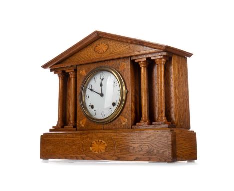 EARLY 20TH CENTURY AMERICAN OAK CASED MANTEL CLOCK,attributed to Seth Thomas, of architectural form with marquetry inlay, wit