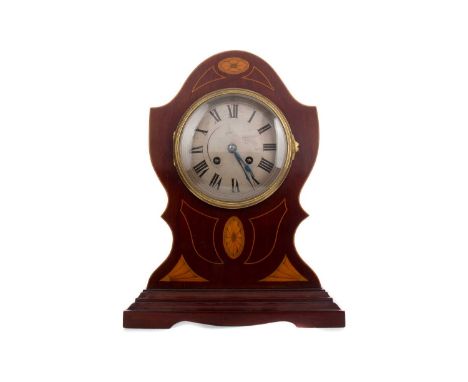 EDWARDIAN SHERATON REVIVAL MANTEL CLOCK,with two train eight day movement striking on a coil, the silvered dial with Roman nu