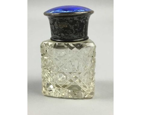 SILVER GUILLOCHE ENAMEL AND CUT GLASS SCENT BOTTLE,5.3cm high, along with snuff boxes, lighters, ink wells, religious medals,