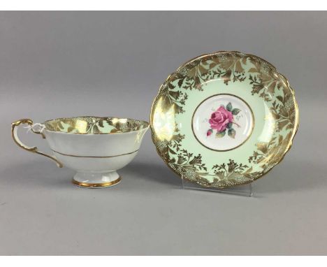 PARAGON TEA SERVICE,decorated with roses, comprising six cups, saucers and side plates