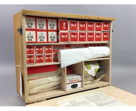 CIRCA 1960S FIRST AID BOX,with original contents including boxed bandages, dressings, safety pins, plasters and a tourniquet 