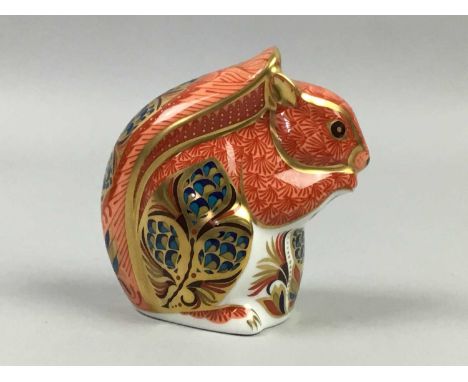 ROYAL CROWN DERBY PAPERWEIGHT,modelled as a squirrel, along with a Royal Albert figure of a squirrel and four Hummel figures 