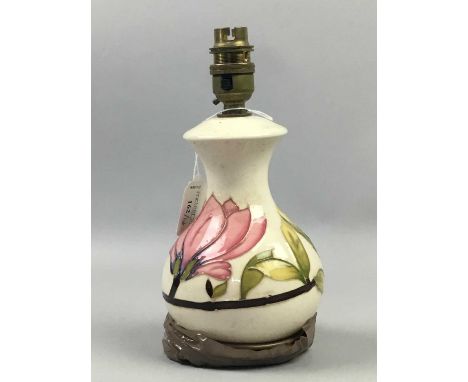 MOORCROFT POTTERY LAMP,20cm high, without shade, along with other ceramics including a vase, saucers and a figure of a dog, a