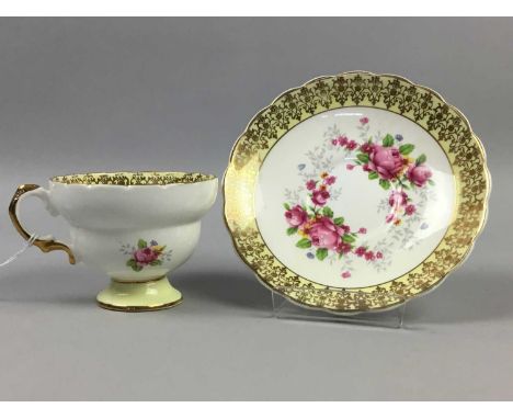 PART TEA SERVICE,with floral and gilt decoration on white and yellow grounds, along with various drinking glasses including a