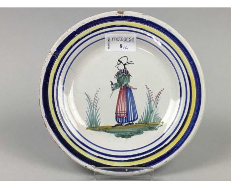 FOUR NINETEENTH CENTURY QUIMPER SIDE PLATES,with figural decoration within linear borders, 198.2cm diameter (4)
