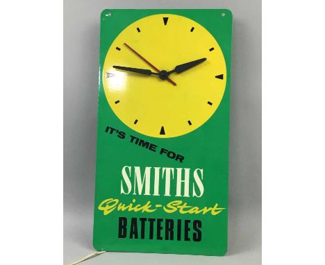 SMITHS QUICK-START BATTERIES ADVERTISEMENT CLOCK,42cm high, along with a Statue of Liberty table lamp, a Poole Aegean dish, a