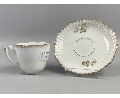 KPM PART TEA SERVICE,transfer decorated with floral sprays, within gilt speckled borders, comprising ten cups, eleven saucers
