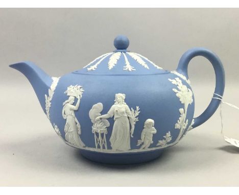 WEDGWOOD BLUE JASPER WARE TEAPOT,along with other blue Jasper Ware including a dish and two lidded shaped boxes, a red Jasper