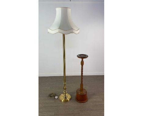 BRASS FLOOR LAMP, with shade, 180cm high overall, along with a brass embossed magazine rack and a smokers stand (3)