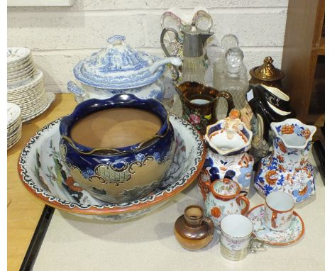 A 19th century blue and white circular two-handled tureen and cover, with ladle, decorated with figure within ruins, 25cm dia