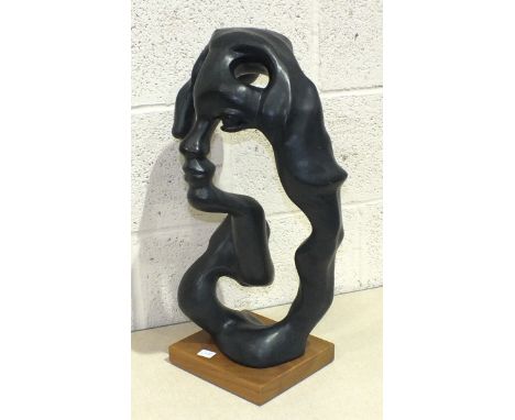 A reproduction of Klara Sever's Surrealist sculpture 'Portrait of a Woman', reproduction by Austin Sculpture 1979, in bronzed