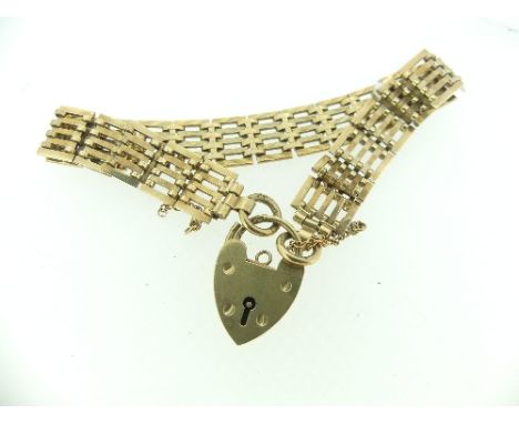 A 9ct yellow gold gate link Bracelet, together with 9ct gold padlock clasp, approx total weight 15g.