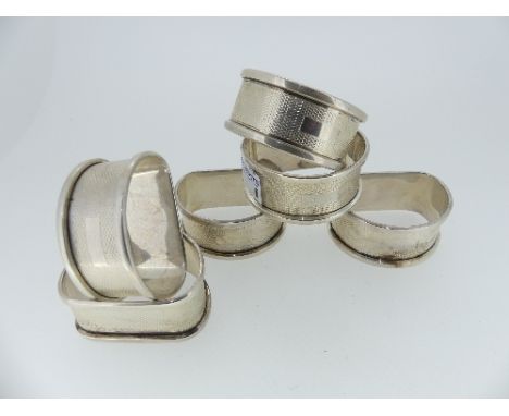 A set of six Edward VIII silver Napkin Rings, hallmarked Birmingham, 1936, of semi-circular form with engine turned decoratio