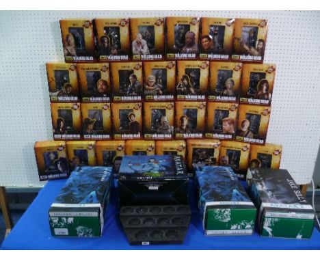 The Walking Dead; A collection of Eaglemoss Collections 1:21 scale resin Figures, all boxed, together with a resin display st