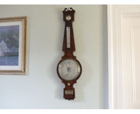 George III walnut Barometer, with engraved silvered dial.