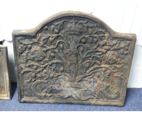 A Carolean-style  cast iron Fireback, with shaped top and embossed with 'C R' , oak tree and crown decoration, 33in wide x 28
