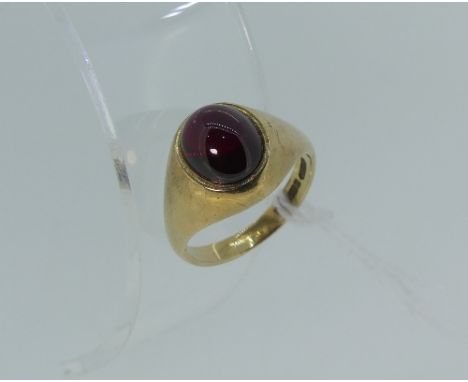 A 9ct yellow gold Gentleman's signet Ring, with centre set with a cabochon synthetic ruby, Size W½.