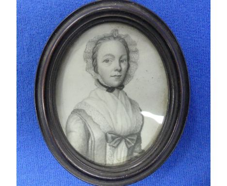 18th century English School, an oval portrait miniature of a young woman, pencil, in oval ebonised frame, overall 3¼in x 2¾in