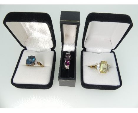 A collection of sixteen 'TV Channel' and Dress Rings, two in 9ct gold, twelve mounted in silver and two unmarked, variously s