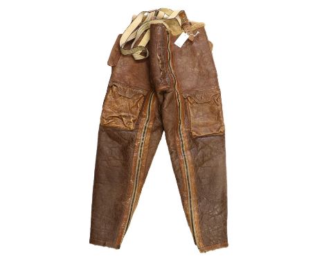 A Pair of Second World War RAF Irvin Sheepskin Flying Trousers, with two front patch pockets with press stud fasteners to the