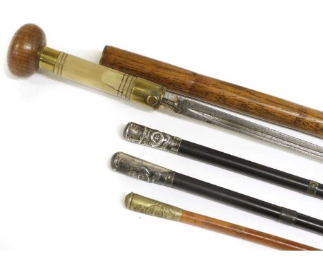 Two Yorkshire Light Infantry Ebony Swagger Sticks, one with silver pommel embossed with the badge of the 51st Yorkshire Light