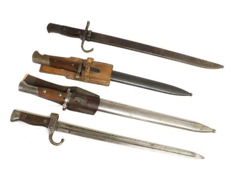 A Czechoslovakian VZ-24 Bayonet, with parkerised steel blade,wood grip scales, steel scabbard the locket stud stamped Z withi