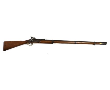A British Snider-Enfield Mark III Military Rifle, the 93cm round blued steel barrel with hinged ladder rearsight, various ins