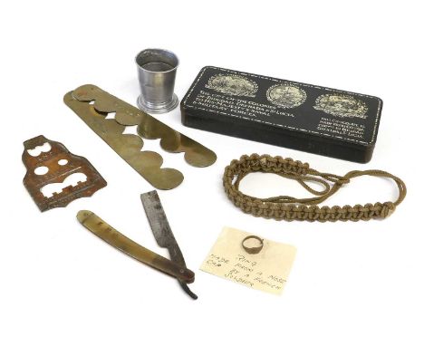 A Selection of First World War Personal Items, including a War Department marked cut throat razor stamped with service number