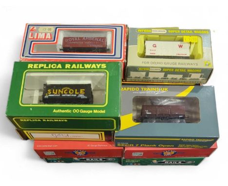 Fifteen assorted boxed wagons includes Lima, Mainline, Oxford and others
