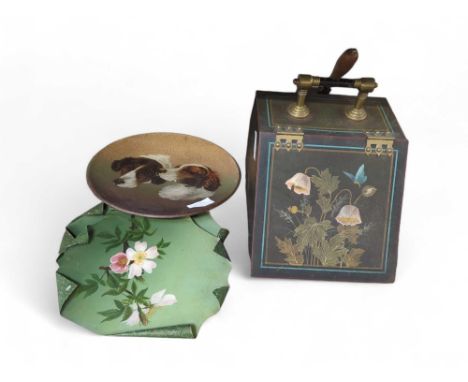 A toleware dish painted with two dogs heads, a painted coal scuttle and another similar item