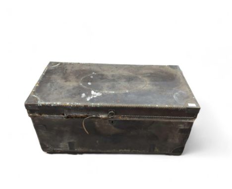 A 19th Century brass studded and leather covered travelling trunk with metal carrying handles to each side 93cms wide