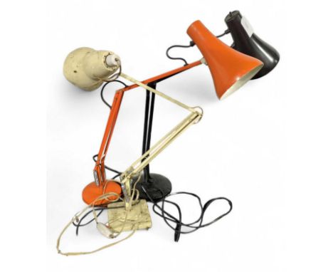 An early white painted angle poise lamp together with an orange Herbert Terry anglepoise lamp and a black anglepoise