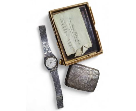 A silver cigarette case, Timex wristwatch and some glass photographic plates from the George Spencer Moulton & Co Ltd, India 