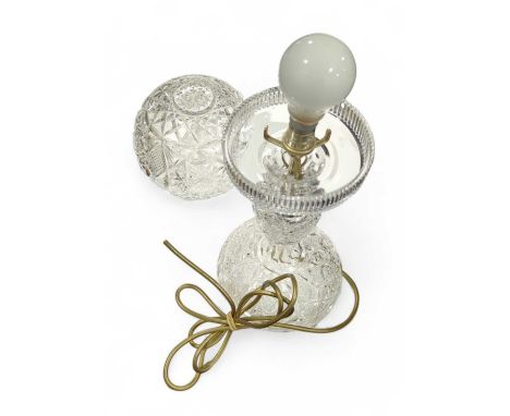 A cut glass table lamp with cut glass globe, 48cms high