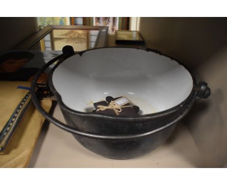 A large cast jam pan having enamel to inside.