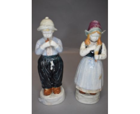 A large selection of Staffordshire flat back figures,spill vases and similar including woman with child reading and gent on h