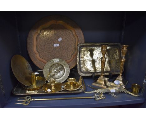 Am assortment of vintage and antique brass ware including candle sticks, trays and more.