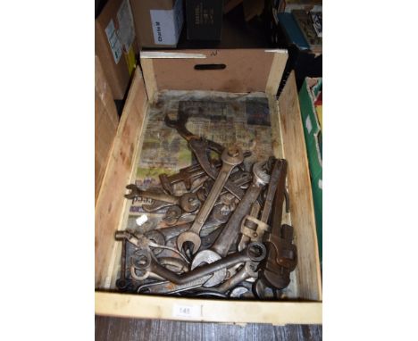 A box of vintage spanners including Whitworth and stilsons.