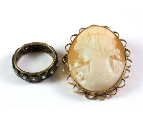 A yellow and white metal (tested gold and silver) stone set ring together with a yellow metal (tested 9ct gold) mounted cameo