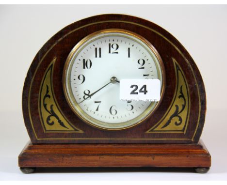 An early 20th century brass inlaid mahogany mantle clock, H. 15cm.
