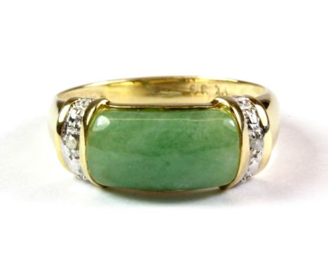 A 9ct yellow gold jade and diamond set ring, (P.5).