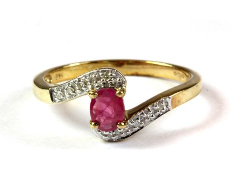 A 9ct yellow gold ruby and diamond set ring, (M.5).