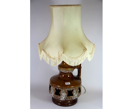 A 1970's ceramic table lamp and shade, H. 80cm.