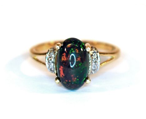 A 9ct yellow gold black opal and diamond set ring, (O.5).
