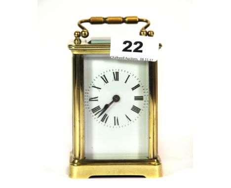 A brass carriage clock, H. 14cm.