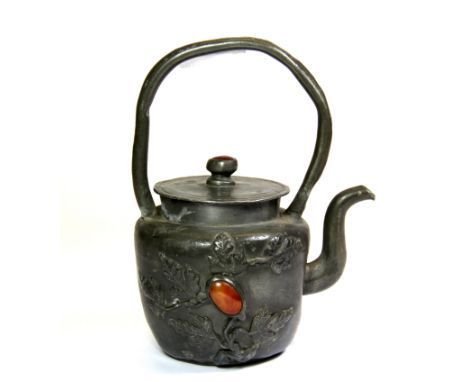A 19th century Chinese pewter kettle inset with agate and jade, H. 18cm.