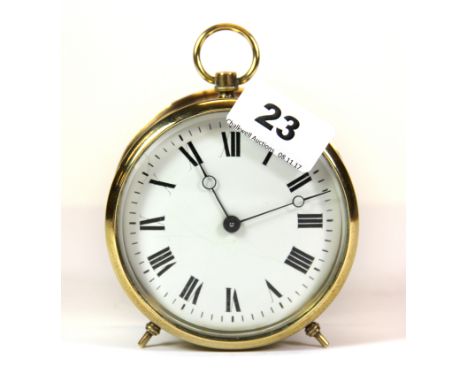 An antique brass mantle clock, H. 12cm.