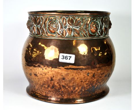 An Art Nouveau hammered copper planter, Dia. 28cm H. 23cm.