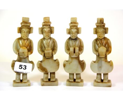 A set of four 19th century Chinese carved jade /  hardstone figures of attendants, H. 14cm, one with old repair.